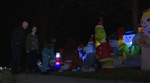 EmVP Family packs lawn with 50 Christmas inflatables